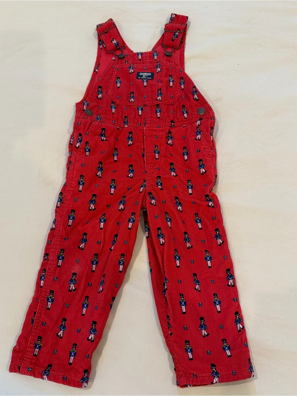 OshKosh B'gosh Red Corduroy Overalls with Toy Soldier Print